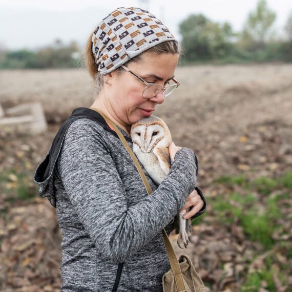 Mandana hugs each owl one by one and bids them farewell, wishing them good health. She says, "The bird's place is in the sky." Nov ,27, 2024 .Gorgan, Iran.